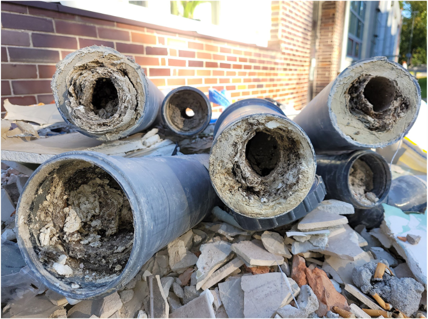 frozen sewage pipes, freezing environments, insulation, heat tracing, drainage, prevention